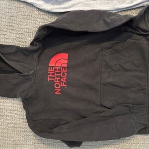 The North Face Black Hoodie with Red Logo Graphic